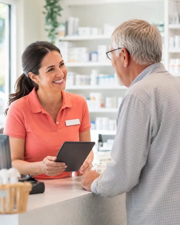 Pharmacy tech checking in a patient